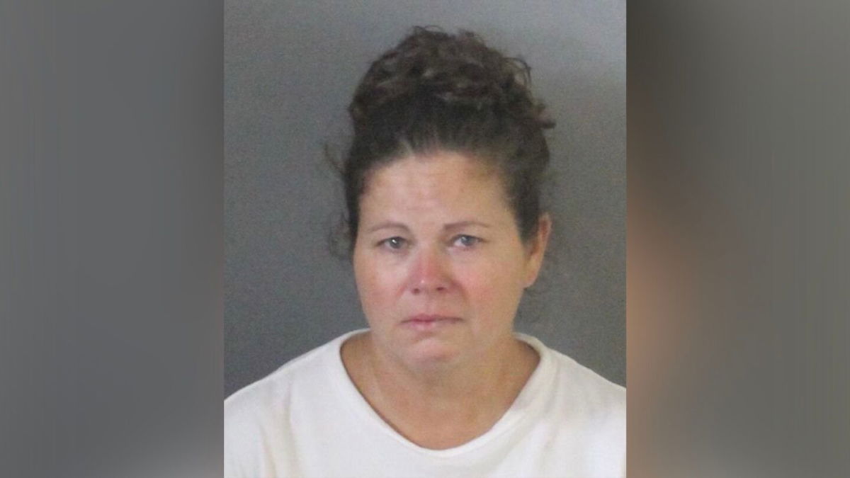 <i>Baker County Sheriff's Office</i><br/>Rhonda Jewell is accused of leaving the 10-month-old baby unattended in the vehicle for “at least 5 hours” while outside temperatures reached 98 degrees Fahrenheit