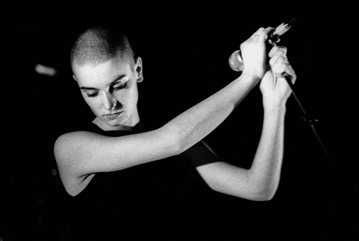 <i>Paul Bergen/Redferns/Getty Images</i><br/>Irish singer Sinead O'Connor performs at Paradiso