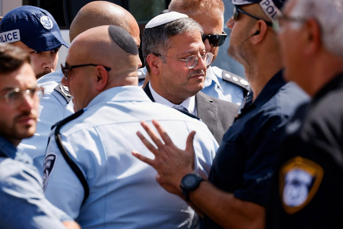 <i>Hazem Bader/AFP/Getty Images</i><br/>Israeli security forces scuffle with a Palestinian man as he tries to enter the al-Aqsa mosque compound to attend  Friday prayers on April 15