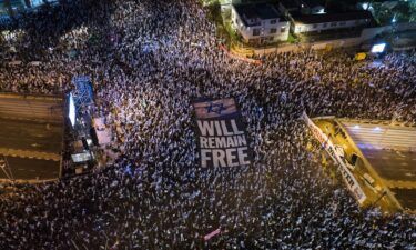 Tens of thousands of Israelis protest against plans by Prime Minister Benjamin Netanyahu's government to overhaul the judicial system in Tel Aviv