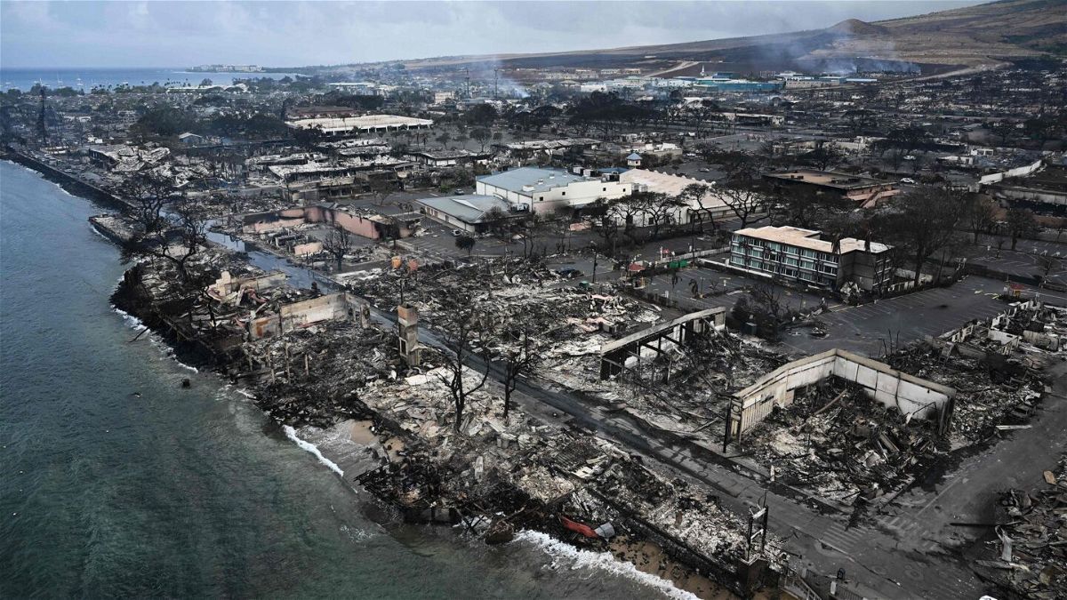 <i>Patrick T. Fallon/AFP/Getty Images</i><br/>An aerial image taken on August 10 shows destroyed homes and buildings on the waterfront burned to the ground in Lahaina in the aftermath of wildfires in western Maui