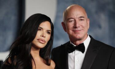 Lauren Sanchez (left) and Jeff Bezos arrive at the Vanity Fair Oscar party after the 95th Academy Awards