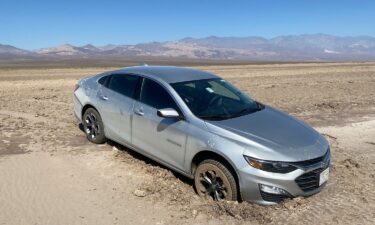 The car was removed using a skid steer that followed the same tracks to minimize additional damage.