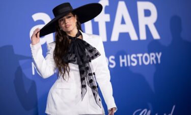 Ashley Graham poses for photographers upon arrival at the amfAR Cinema Against AIDS benefit during the Cannes Film Festival on May 25.