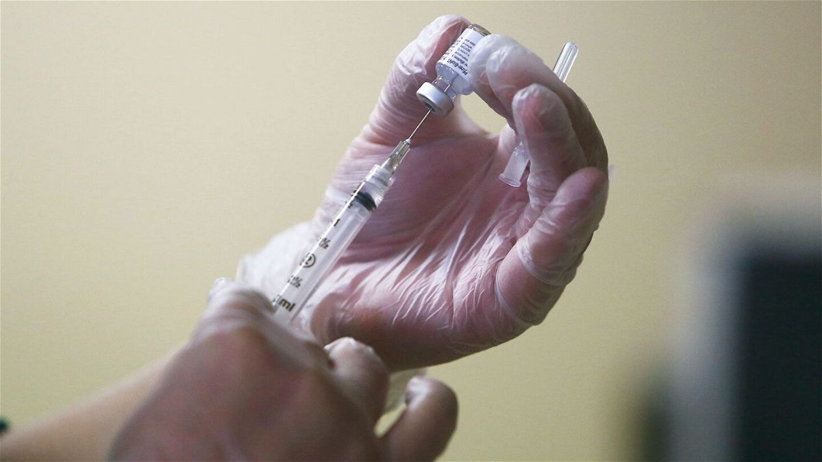 <i>Lea Suzuki/San Francisco Chronicle/AP/FILE</i><br/>Major pharmacy chains have begun rolling out flu and RSV vaccine appointments and say they'll offer the updated Covid-19 boosters when they're available.