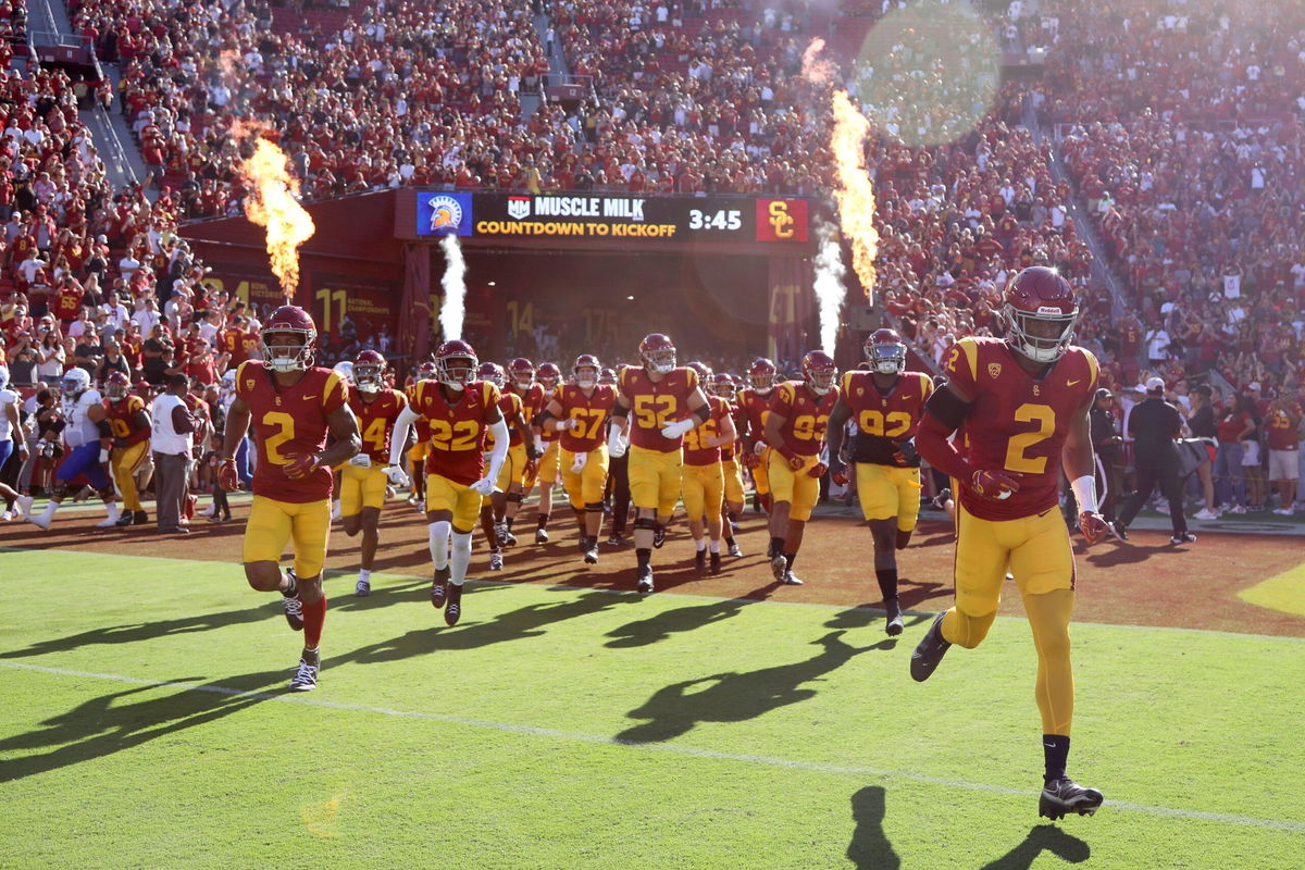 <i>Katelyn Mulcahy/Getty Images</i><br/>The USC Trojans run onto the field prior to the game against the San Jose State Spartans in August.