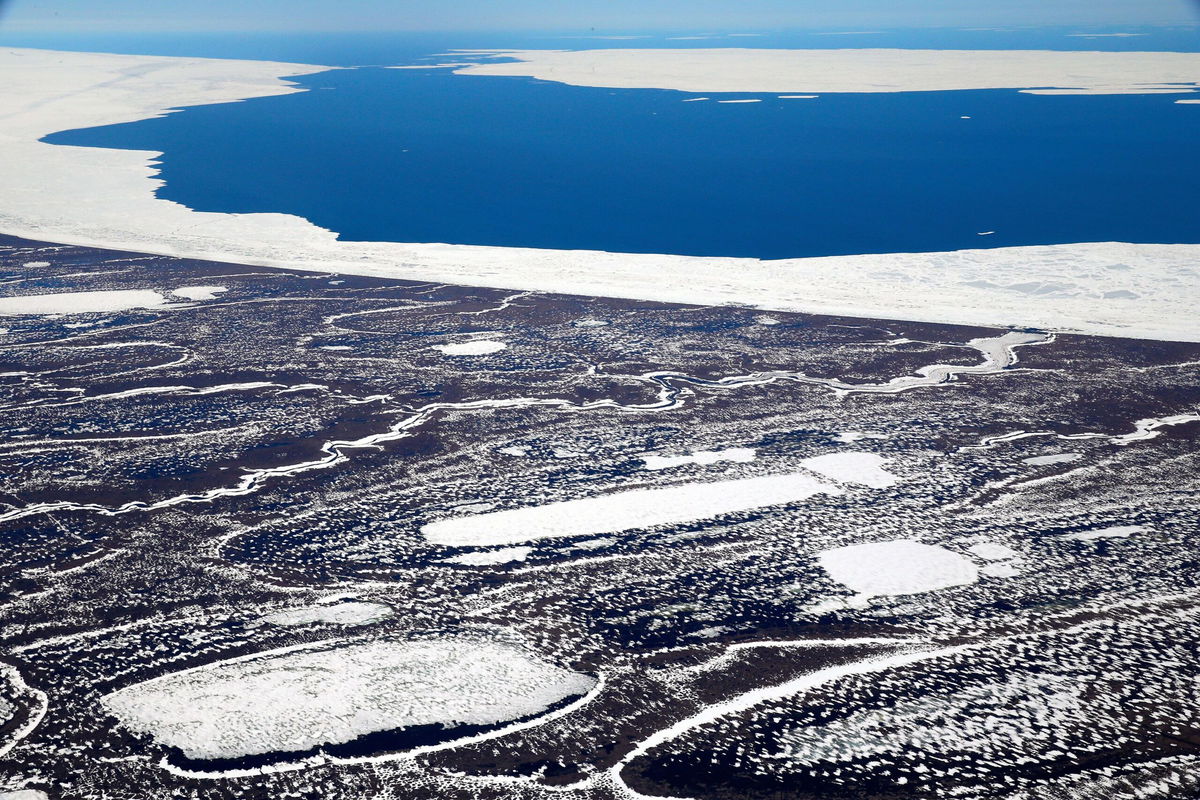 <i>The Asahi Shimbun/Getty Images</i><br/>Abrupt thaws in Arctic permafrost that could potentially release infectious pathogens will become more common as the climate warms. In this aerial image