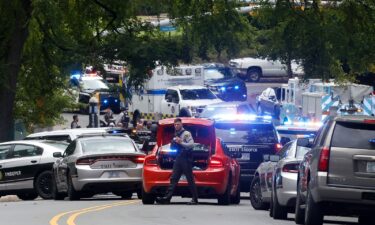 Emergency responders gather on South Street near the Bell Tower on the University of North Carolina at Chapel Hill campus on Monday.