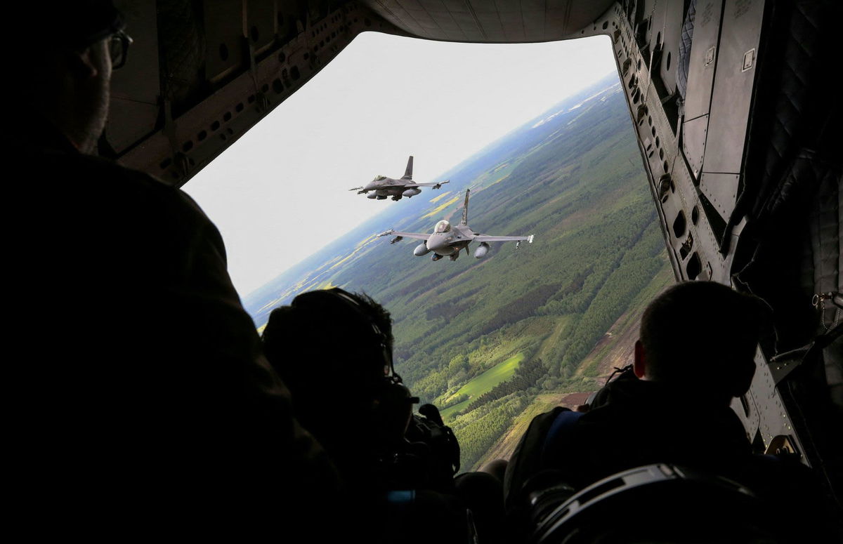 <i>Petras Malukas/AFP/Getty Images</i><br/>Portuguese Air Force F-16 military fighter jets participate in NATO's Baltic Air Policing Mission in Lithuanian airspace near Siauliai