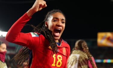 Spain's Salma Paralluelo celebrates as her teammates run onto the pitch after defeating Sweden in the Women's World Cup semifinal.