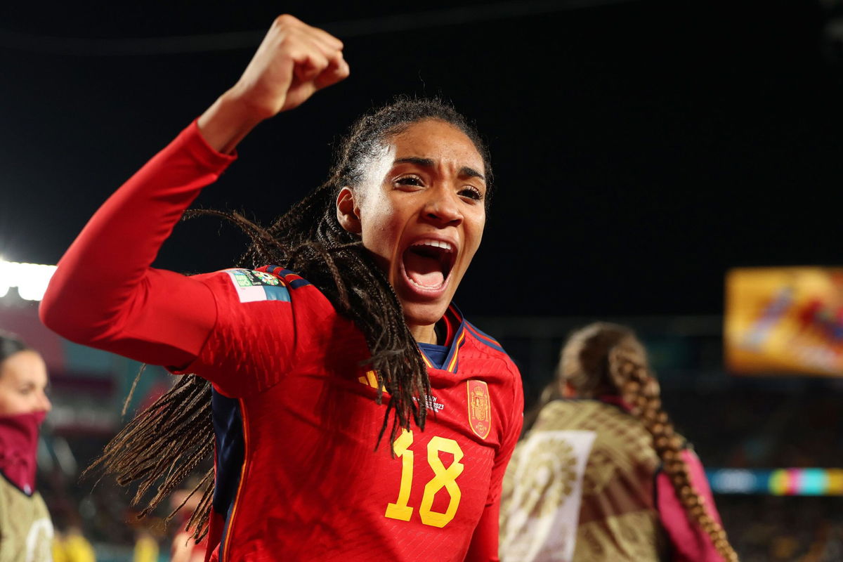 <i>Andrew Cornaga/AP</i><br/>Spain's Salma Paralluelo celebrates as her teammates run onto the pitch after defeating Sweden in the Women's World Cup semifinal.