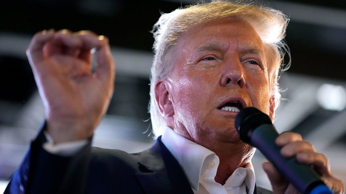 <i>Charlie Neibergall/AP</i><br/>Republican presidential candidate former President Donald Trump speaks to supporters during a visit to the Iowa State Fair