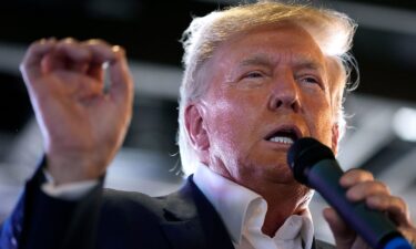 Republican presidential candidate former President Donald Trump speaks to supporters during a visit to the Iowa State Fair