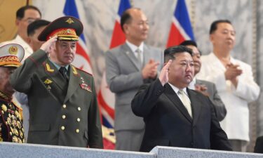 North Korean leader Kim Jong Un and Russian Defense Minister Sergei Shoigu attend a military parade in Pyongyang on July 27.