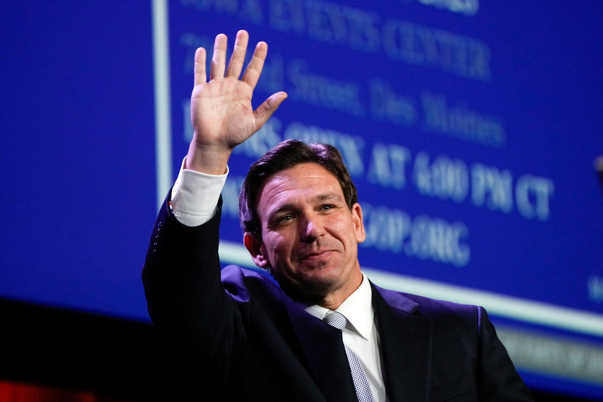 <i>Charlie Neibergall/AP</i><br/>Florida Gov. Ron DeSantis waves at the Republican Party of Iowa's 2023 Lincoln Dinner in Des Moines on July 28.