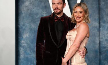 Matthew Koma (left) and Hilary Duff are pictured here at the 2023 Vanity Fair Oscar party in Beverly Hills.