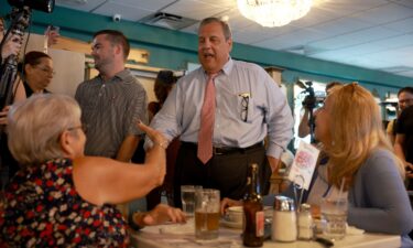 Christie greets people during his town hall at the Casa Cuba restaurant in Miami on August 18.