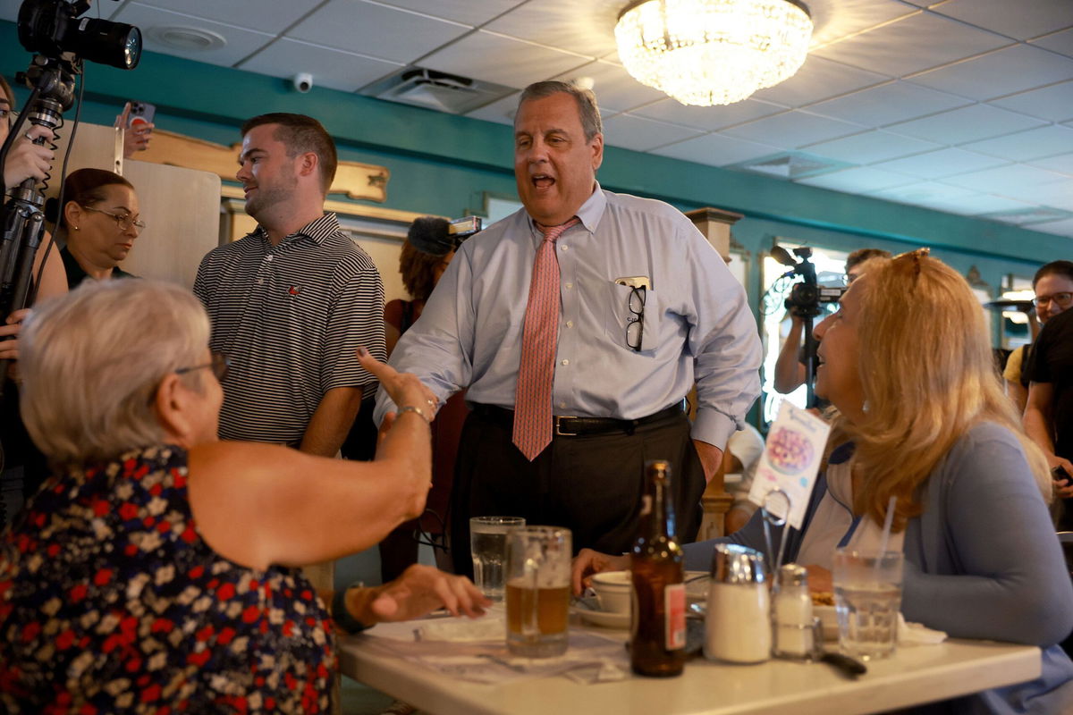 <i>Joe Raedle/Getty Images</i><br/>Christie greets people during his town hall at the Casa Cuba restaurant in Miami on August 18.