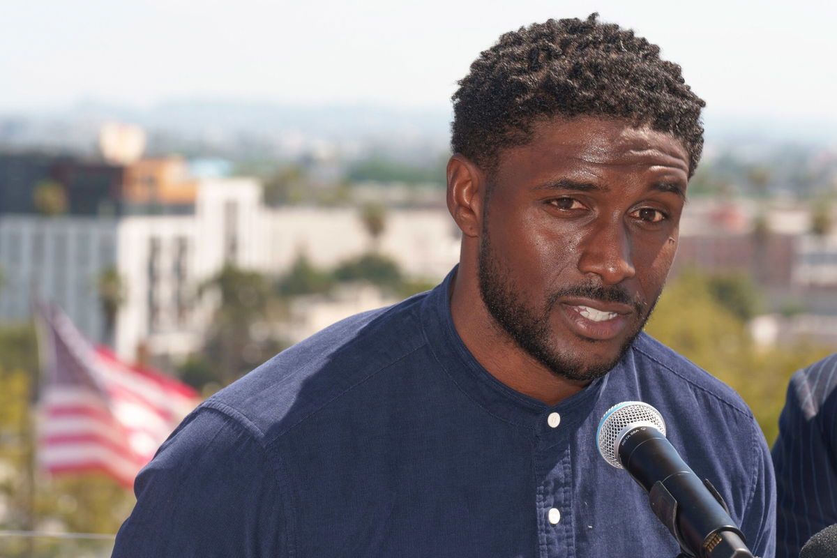 <i>Damian Dovarganes/AP</i><br/>Former USC football player Reggie Bush speaks at a news conference announcing a defamation lawsuit against the NCAA at the Los Angeles Memorial Coliseum.