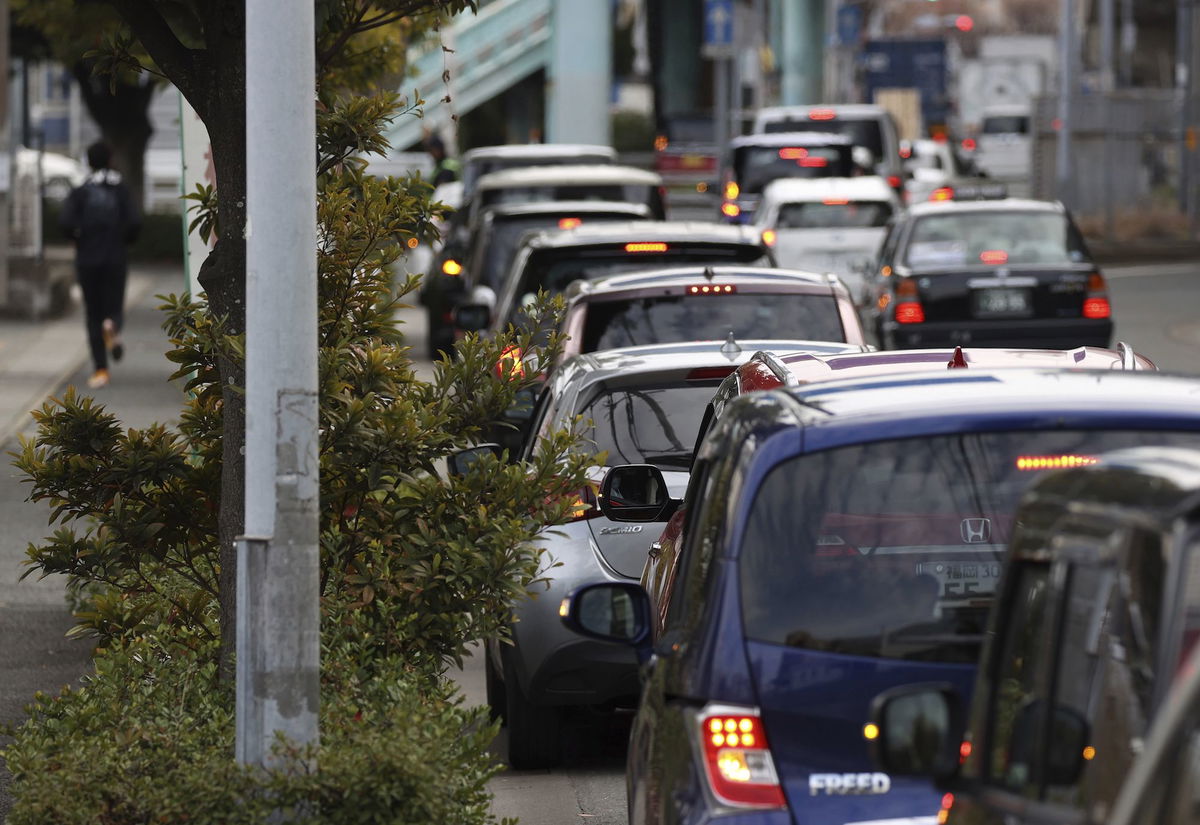 <i>Daisuke Tomita/The Yomiuri Shimbun/AP</i><br/>Japan drunk driving campaign gets motorists tipsy before putting them behind the wheel. Pictured are cars in Fukuoka City