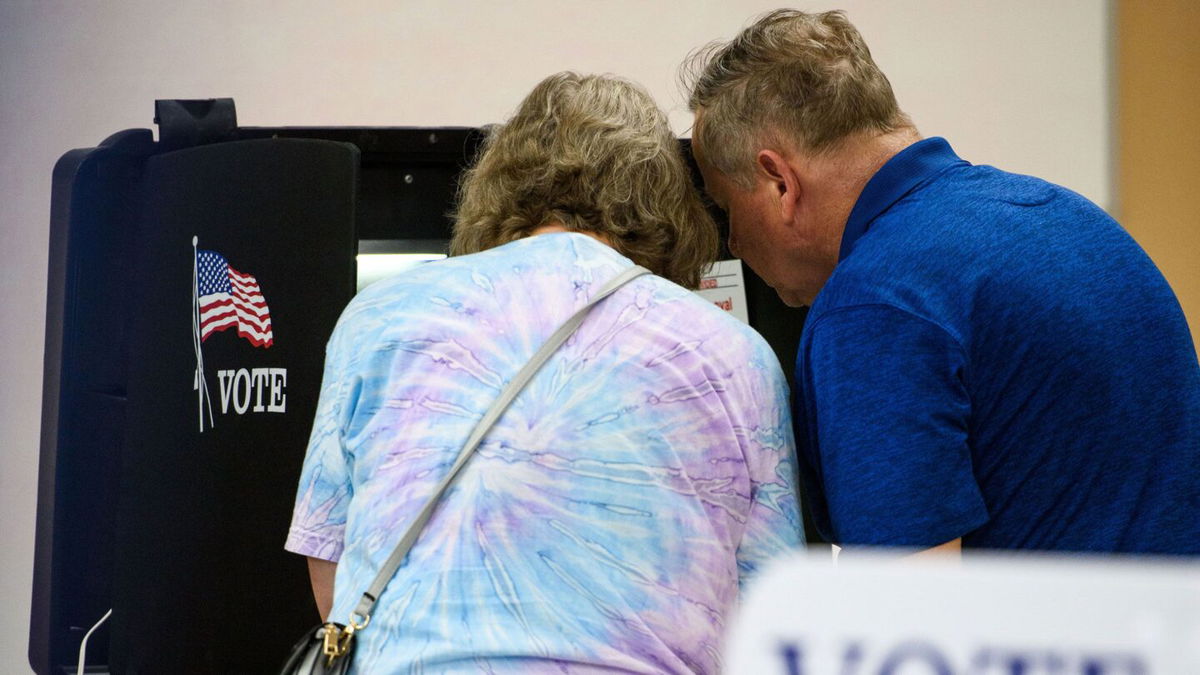 <i>Melissa Sue Gerrits/Getty Images</i><br/>A couple fill out their primary ballots on May 17