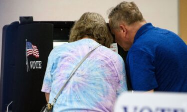 A couple fill out their primary ballots on May 17