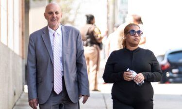 Deja Taylor arrives with attorney James Ellenson at the Newport News Sheriff's Office in April.