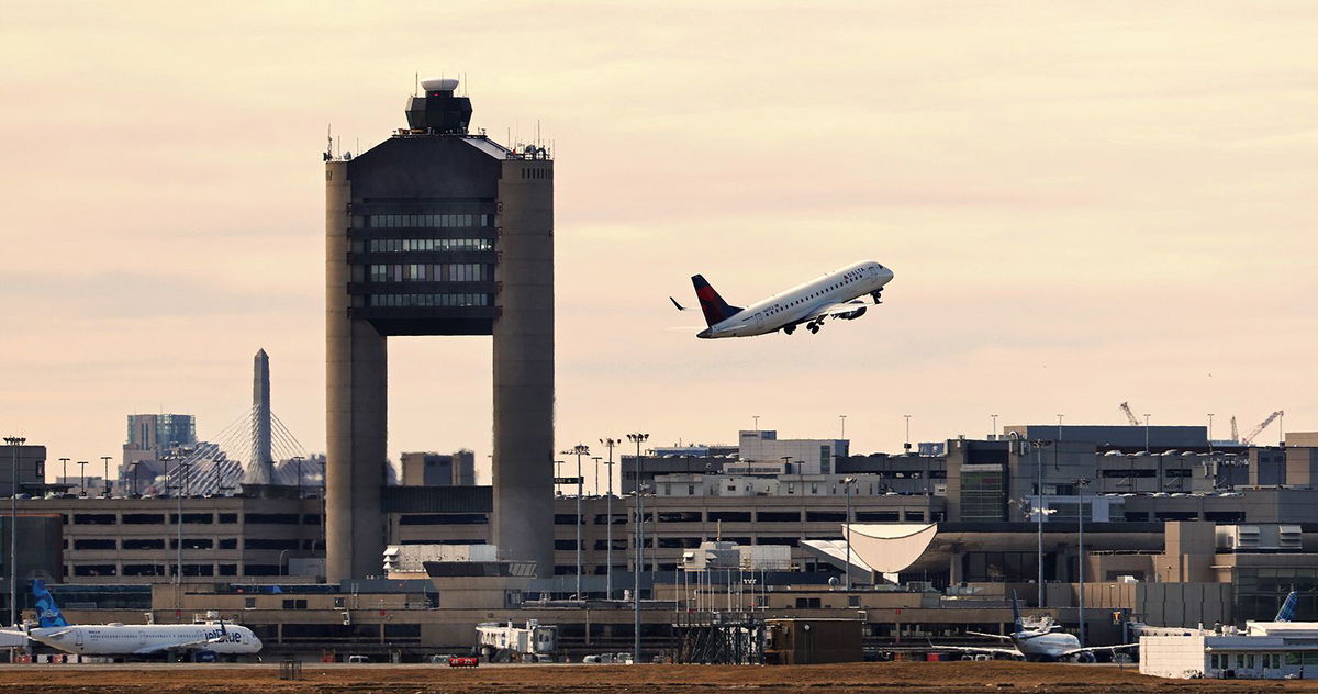 <i>NTSB</i><br/>This screen capture from a jump-seat occupant's video shows the Learjet passing in front of the JetBlue plane at Boston Logan International Airport in February.