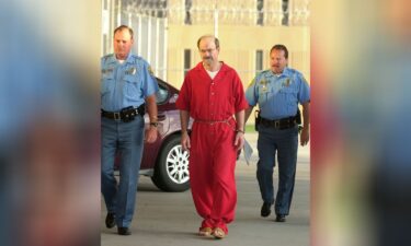 Convicted serial killer Dennis Rader walks into the El Dorado Correctional Facilityon August 19