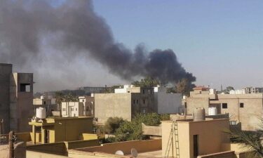 Smoke rises amid clashes between armed factions in Tripoli