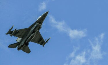 A US Air Force F-16 aircraft flies near the Rionegro Airport during military drills between the Colombia and the United States Air Forces in Rionegro