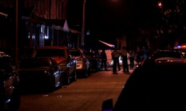 Police respond to the scene of a shooting in West Philadelphia early Saturday