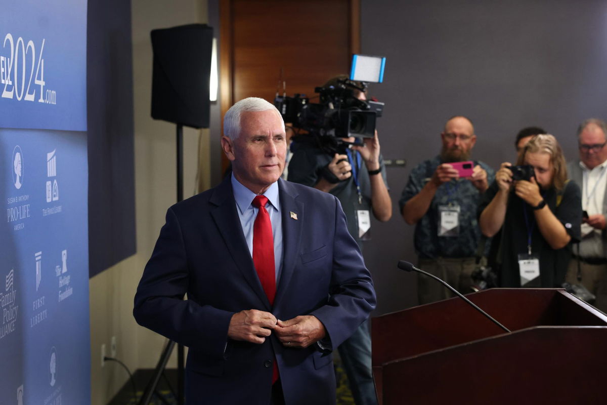 <i>Scott Olson/Getty Images</i><br/>Former Vice President Mike Pence speaks to the press on July 14 in Des Moines