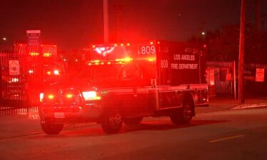 An emergency vehicle sits outside White Memorial Hospital.