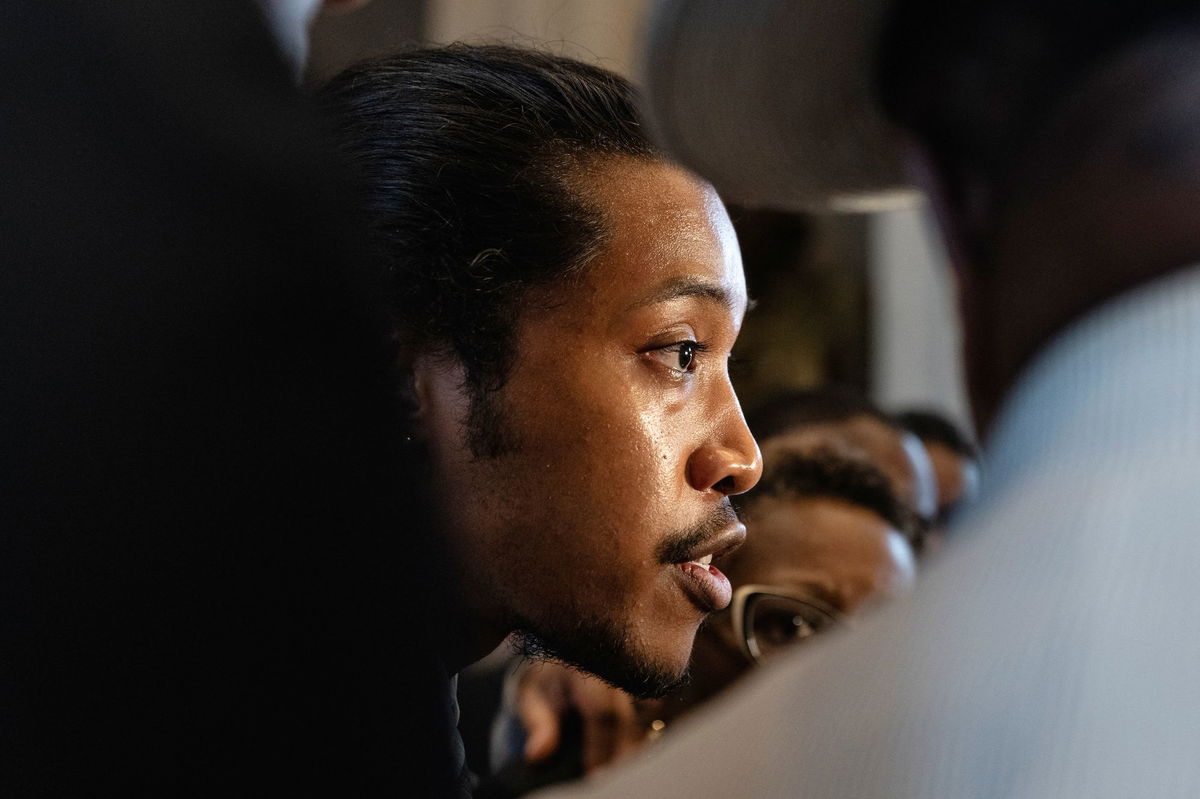 <i>Cheney Orr/Reuters</i><br/>Democratic Tennessee State Rep. Justin Jones speaks to reporters outside the House chamber on Monday after he was silenced by a procedural move during a special session in Nashville.