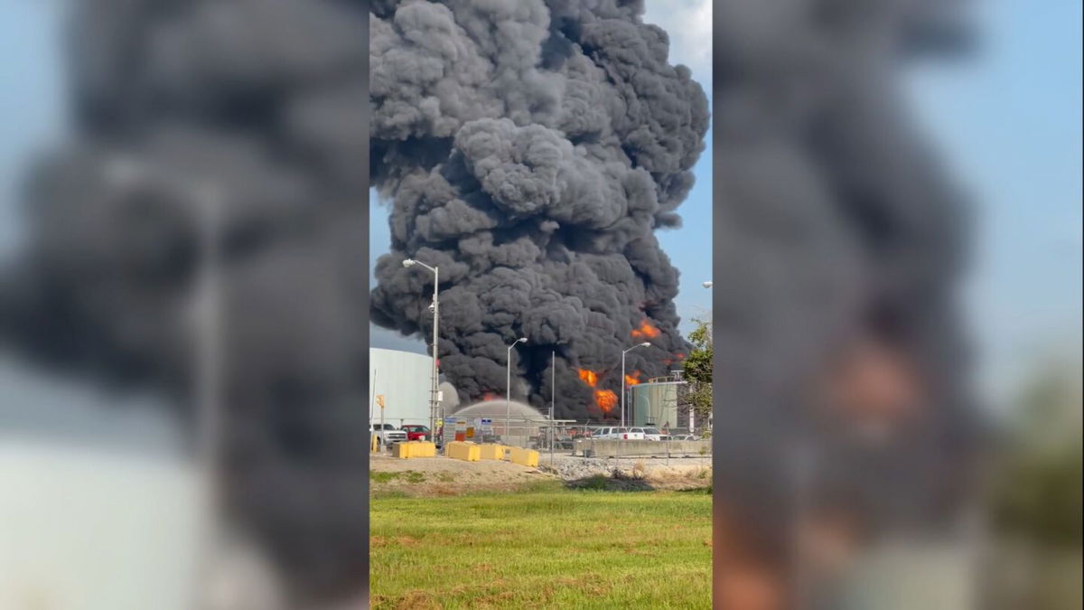 <i>Jessie Oubre III</i><br/>Smoke and flames are pictured rising from a refinery storage tank in Garyville