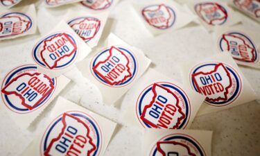 "I voted" stickers are displayed at the exit of the polling site at Toth Elementary School on August 8 in Perrysburg