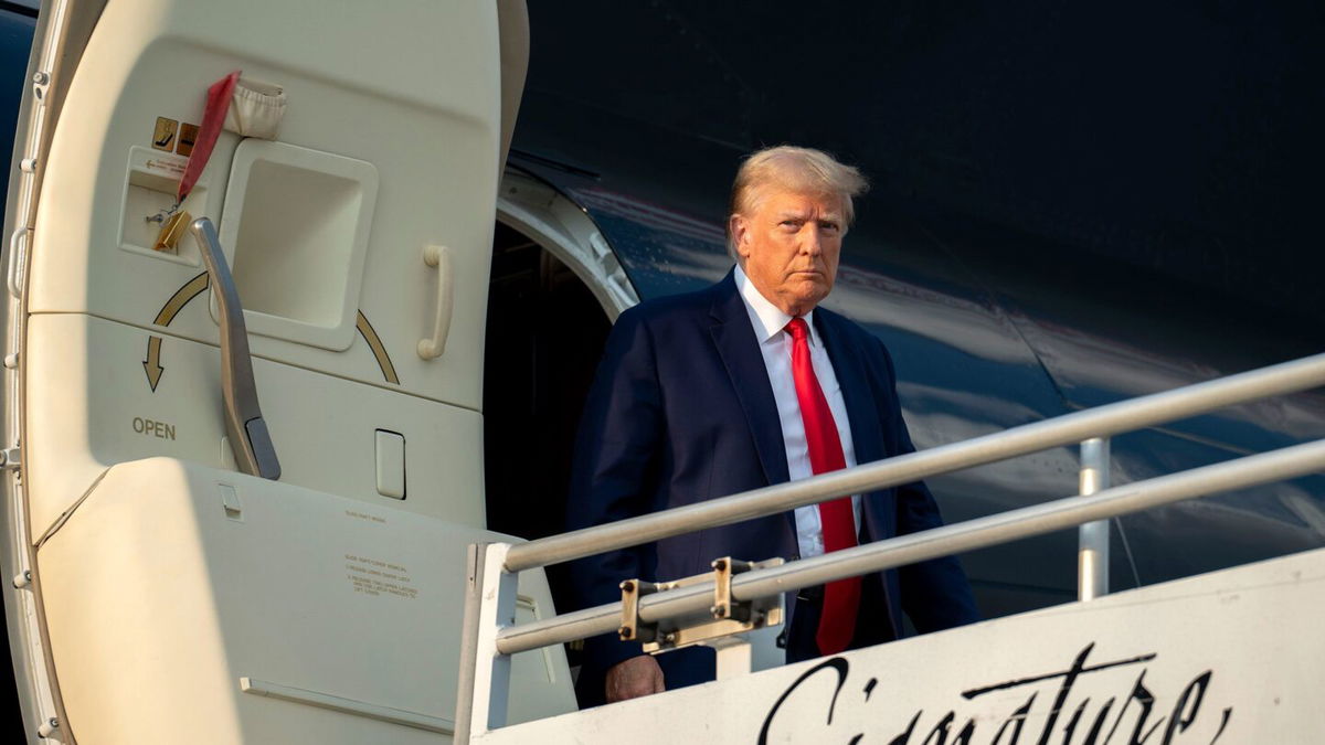 <i>Doug Mills/The New York Times/Redux</i><br/>Donald Trump exits his private plane after arriving in Atlanta on Thursday