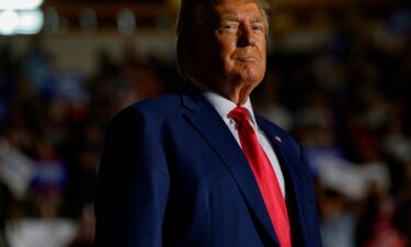 Former President Donald Trump enters Erie Insurance Arena for a rally while campaigning on July 29