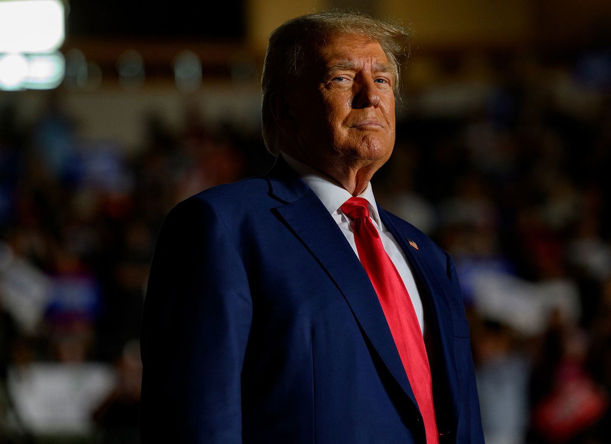 <i>Jeff Swensen/Getty Images</i><br/>Former President Donald Trump enters Erie Insurance Arena for a rally while campaigning on July 29