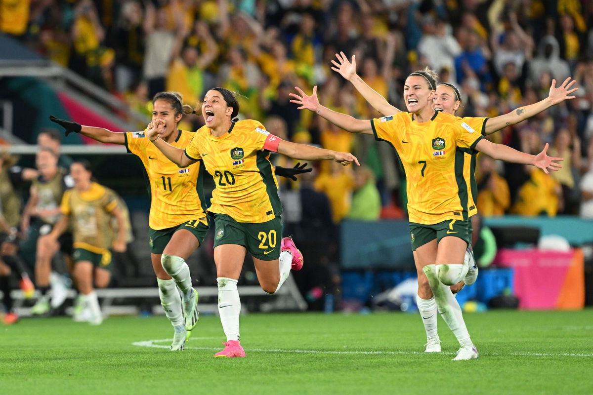 <i>Bradley Kanaris/Getty Images</i><br/>Australia players celebrate during the penalty shootout against France in the Women's World Cup quarterfinals.