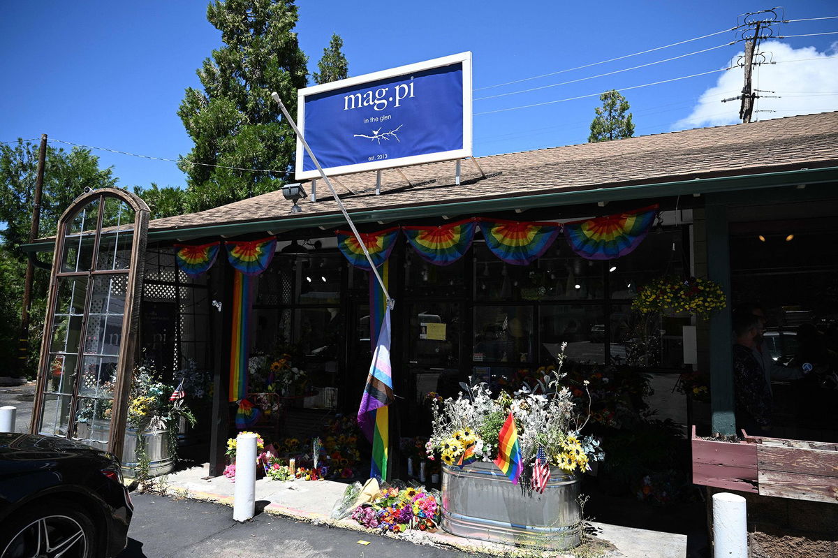 <i>Robyn Beck/AFP/Getty Images</i><br/>A Pride flag ripped off its flagpole is seen outside the entrance to the Mag.Pi clothing in Cedar Glen