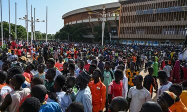 Volunteers gather near General Seyni Kountche Stadium in Niamey