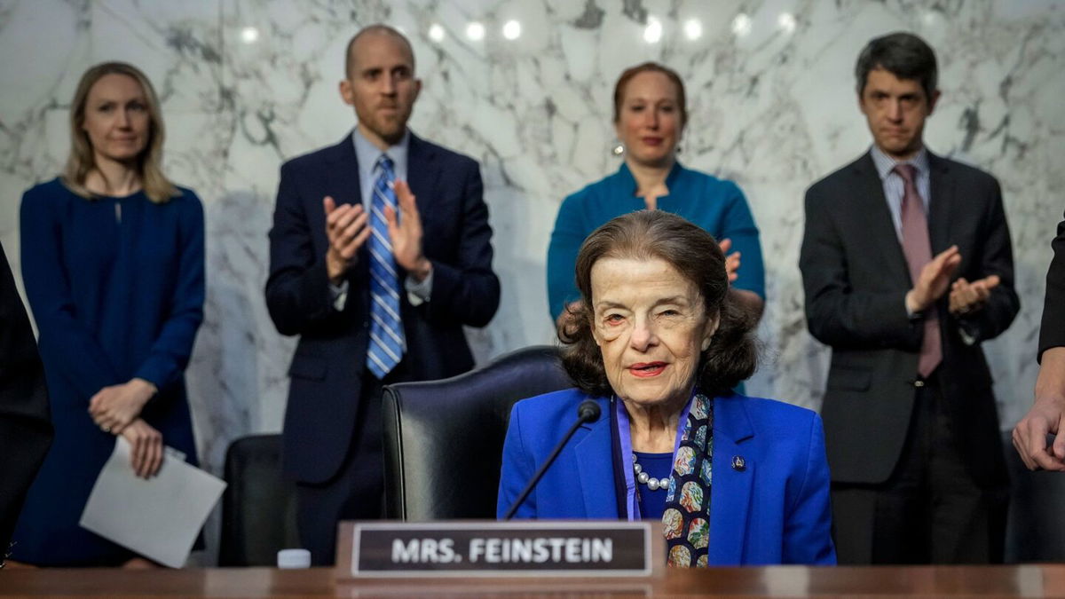 <i>Chip Somodevilla/Getty Images</i><br/>Sen. Dianne Feinstein participates in a reenacted swearing-in with her husband Richard C. Blum and then-Vice President Joe Biden in the Old Senate Chamber at the U.S. Capitol on January 3