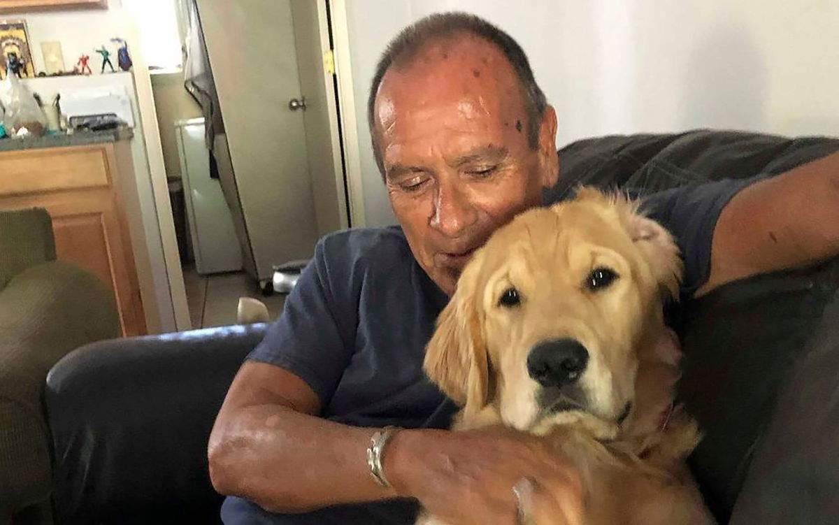 Franklin 'Frankie' Trejos and his roommate's dog, Sam, are seen in an undated picture.