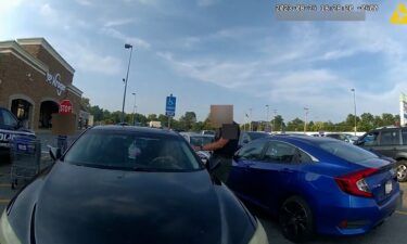 Newly released police body camera footage shows a police officer firing seconds after a pregnant woman started driving as he was in front of her car