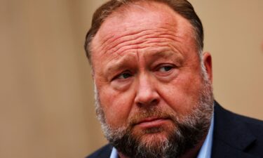 Right-wing conspiracy theorist Alex Jones’ personal spending has increased since he was ordered to pay $1.5 billion in liabilities to Sandy Hook families. Jones is seen here at Connecticut Superior Court in Waterbury