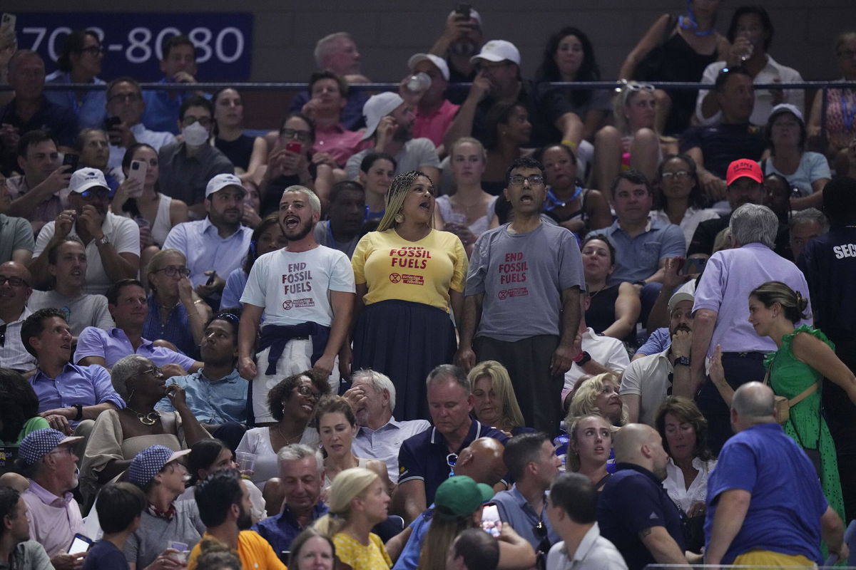 <i>Frank Franklin II/AP</i><br/>Demonstrators at the match between Coco Gauff and Karolina Muchova.