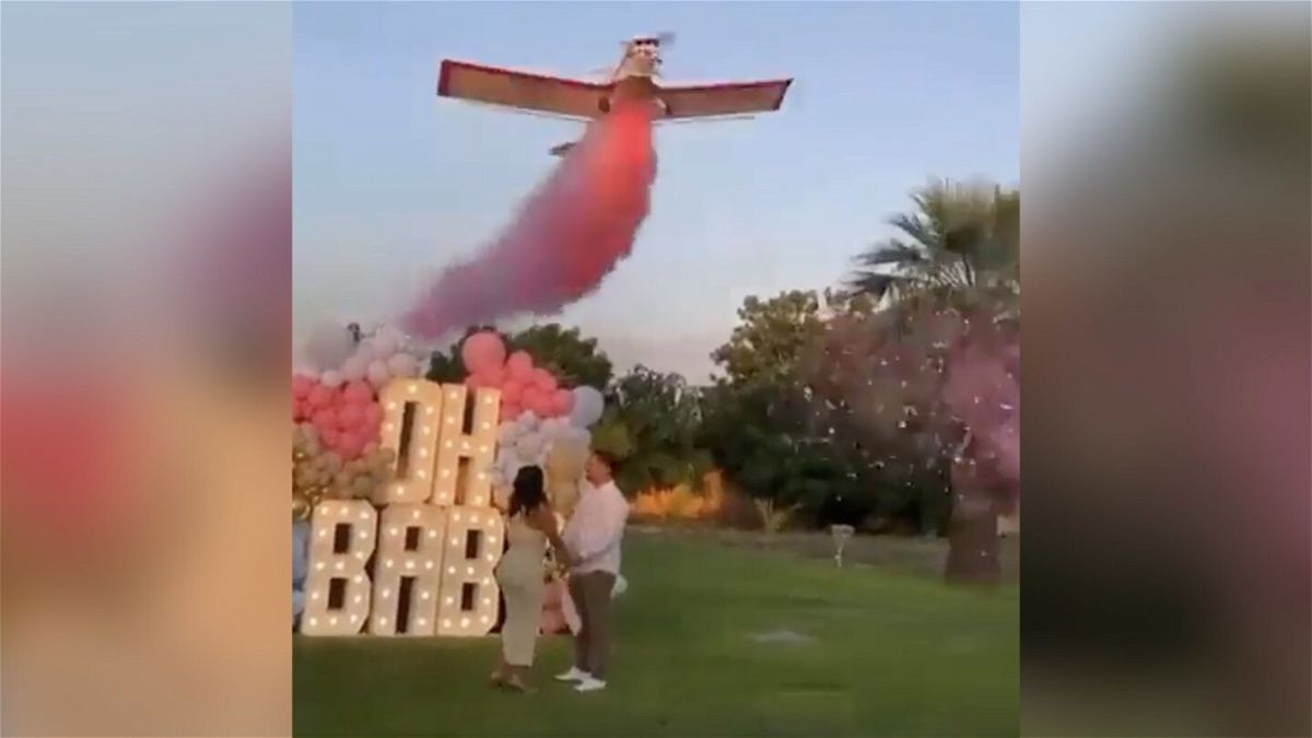 <i>From Twitter</i><br/>A video posted online showed the plane releasing pink smoke before crashing.