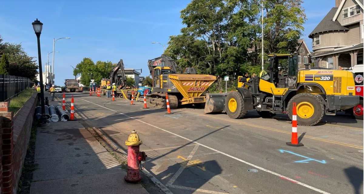 <i></i><br/>Firefighters pull a construction worker from a fallen trench box on Retreat Avenue in Hartford